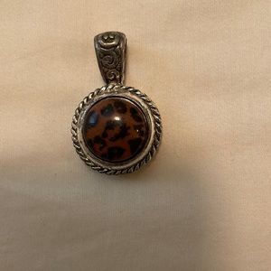 Animal print stone pendant